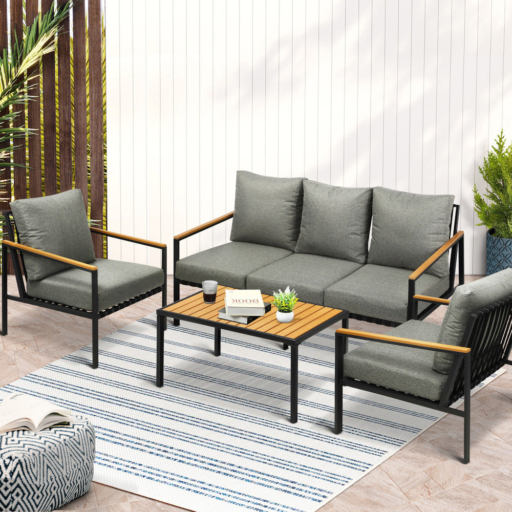 Black Outdoor Patio Set with Table and Cushioned Chairs